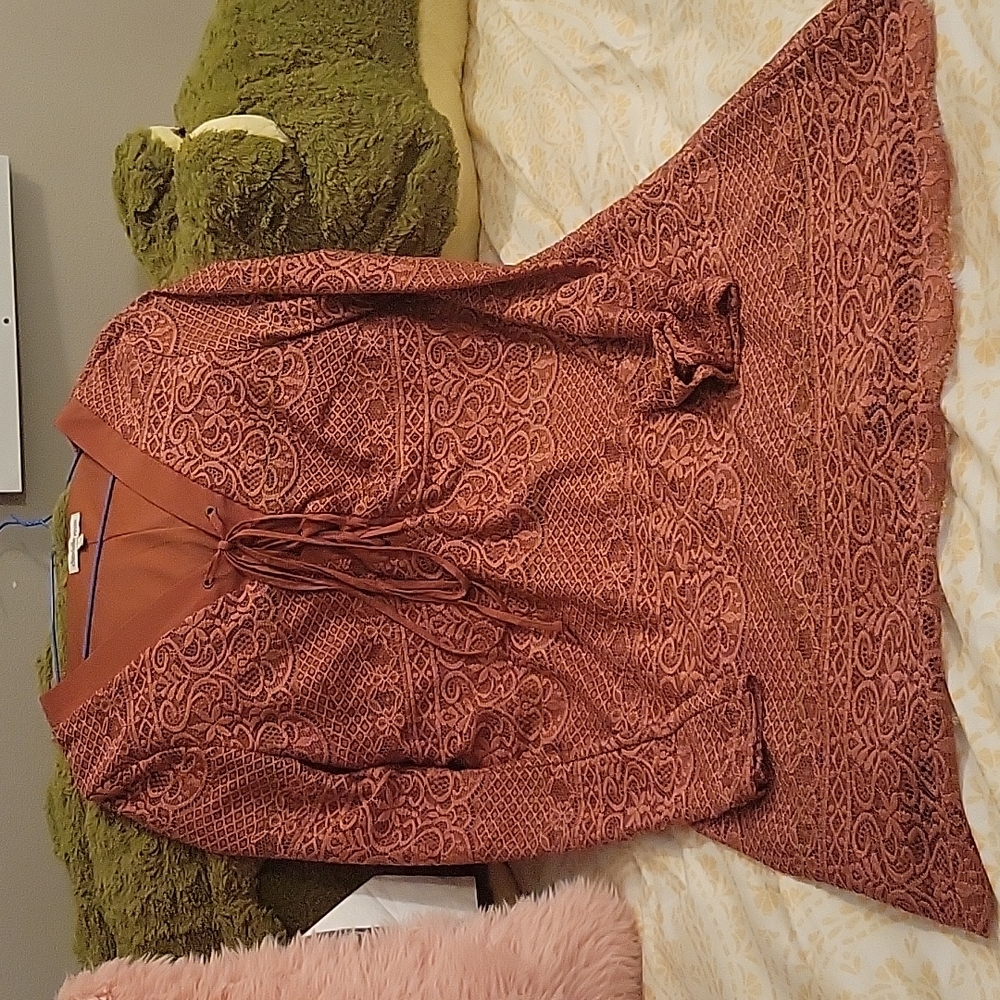 This is a true size. The color is like cimmona color
